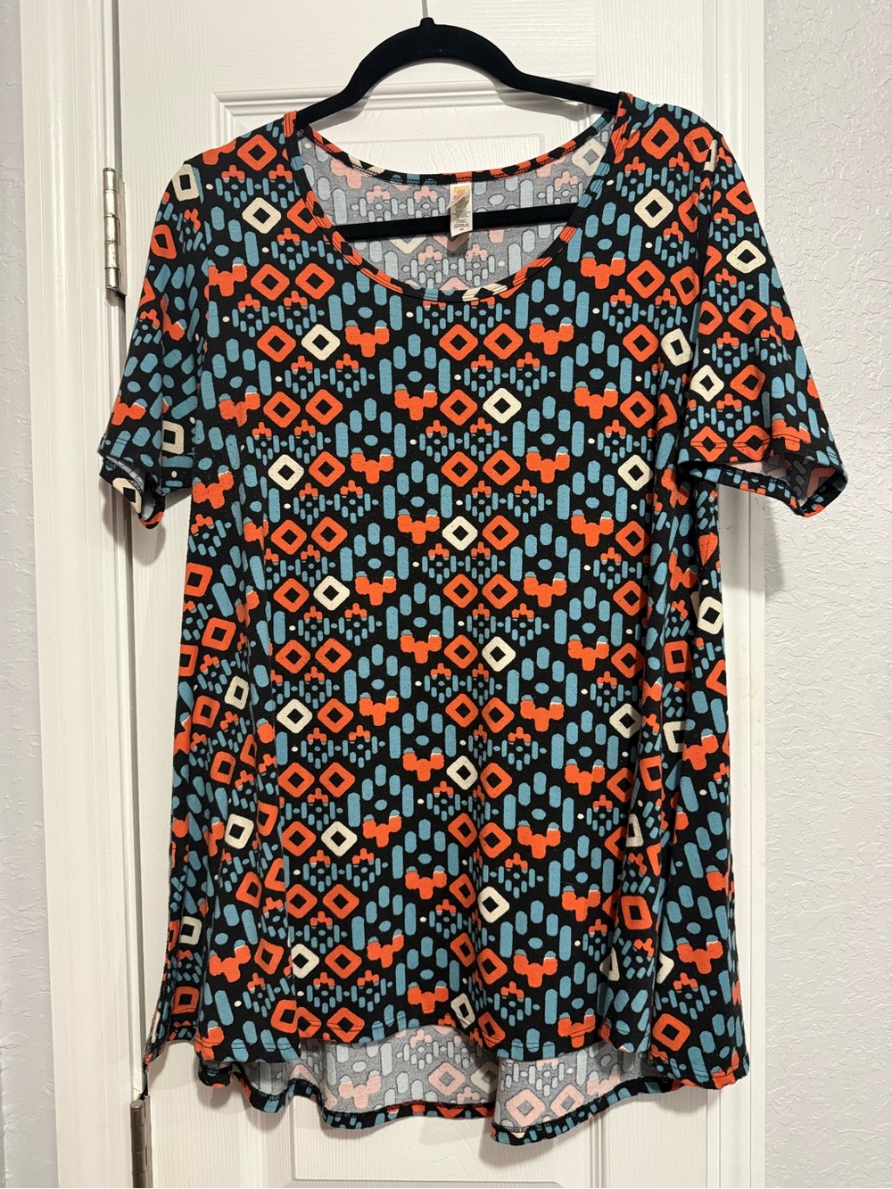 LuLaRoe Black Tunic with Orange, Light Blue, and Cream Geometric Print